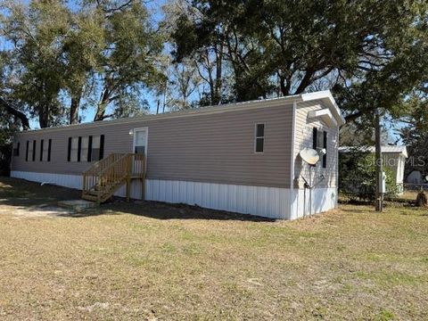 Photo of 102 NE 13th Avenue, Chiefland, FL 32626 (MLS # GC537998)