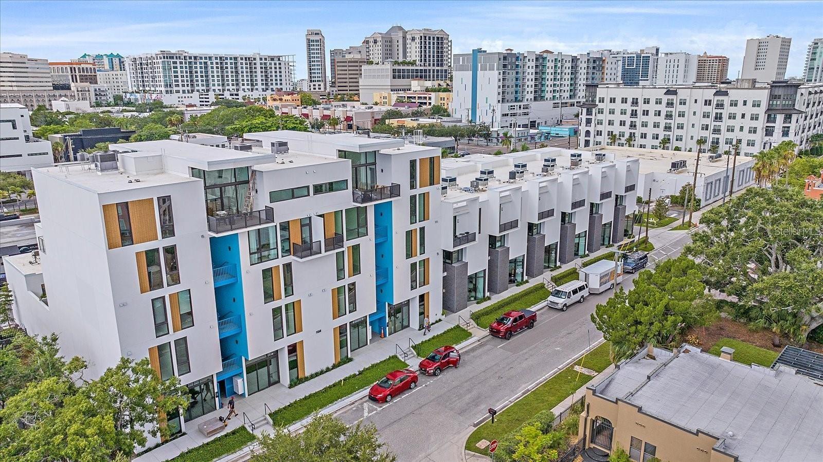 DOWNTOWN SARASOTA...ZAHRADA. Be the first to experience this brand new, never occupied modern 2 story loft in the heart of the vibrant downtown district. This 2 bedroom, 2 bathroom end unit boasts an open floor plan with no one above or below you. Floor to ceiling high impact windows allows for plenty of natural light making it light and bright. Beautiful contemporary kitchen to please any cook with state of the art stainless appliances. The living and dining area opens to an outdoor patio where you can enjoy your morning coffee and evening beverage. The primary bedroom is on the main floor and a loft bedroom, en-suite on the second level. Full size washer & dryer in the unit. Assigned parking space in the garage. Amenities to enjoy in the downtown district, fine and casual dining, boutique shopping, farmers market and our renowned art district, just to name a few. Call now for a showing. This property won't last!