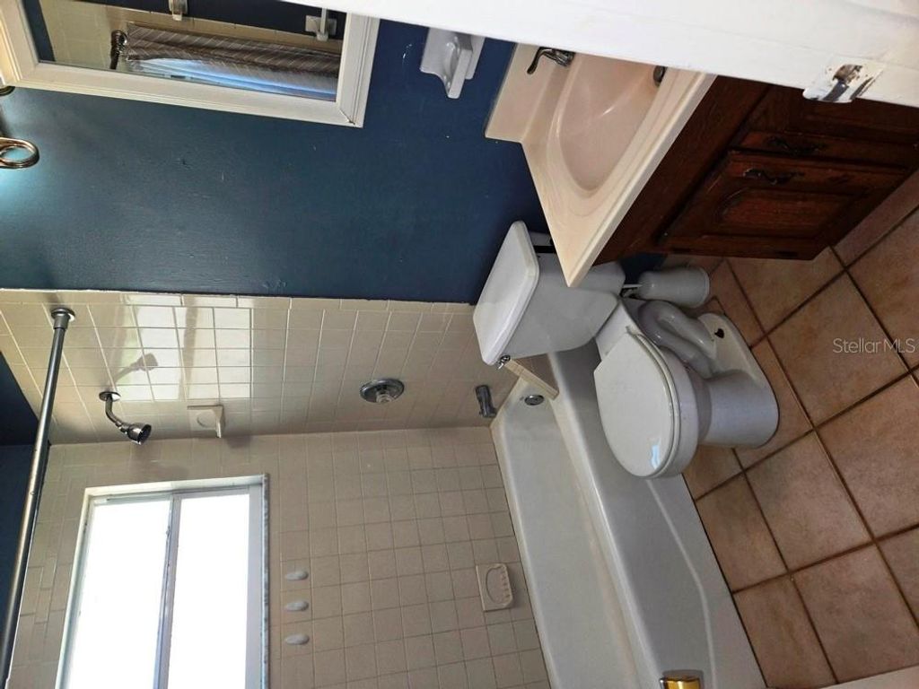 Photo of 1045 Princewood Drive, Orlando, FL 32810 (MLS # O6371327)