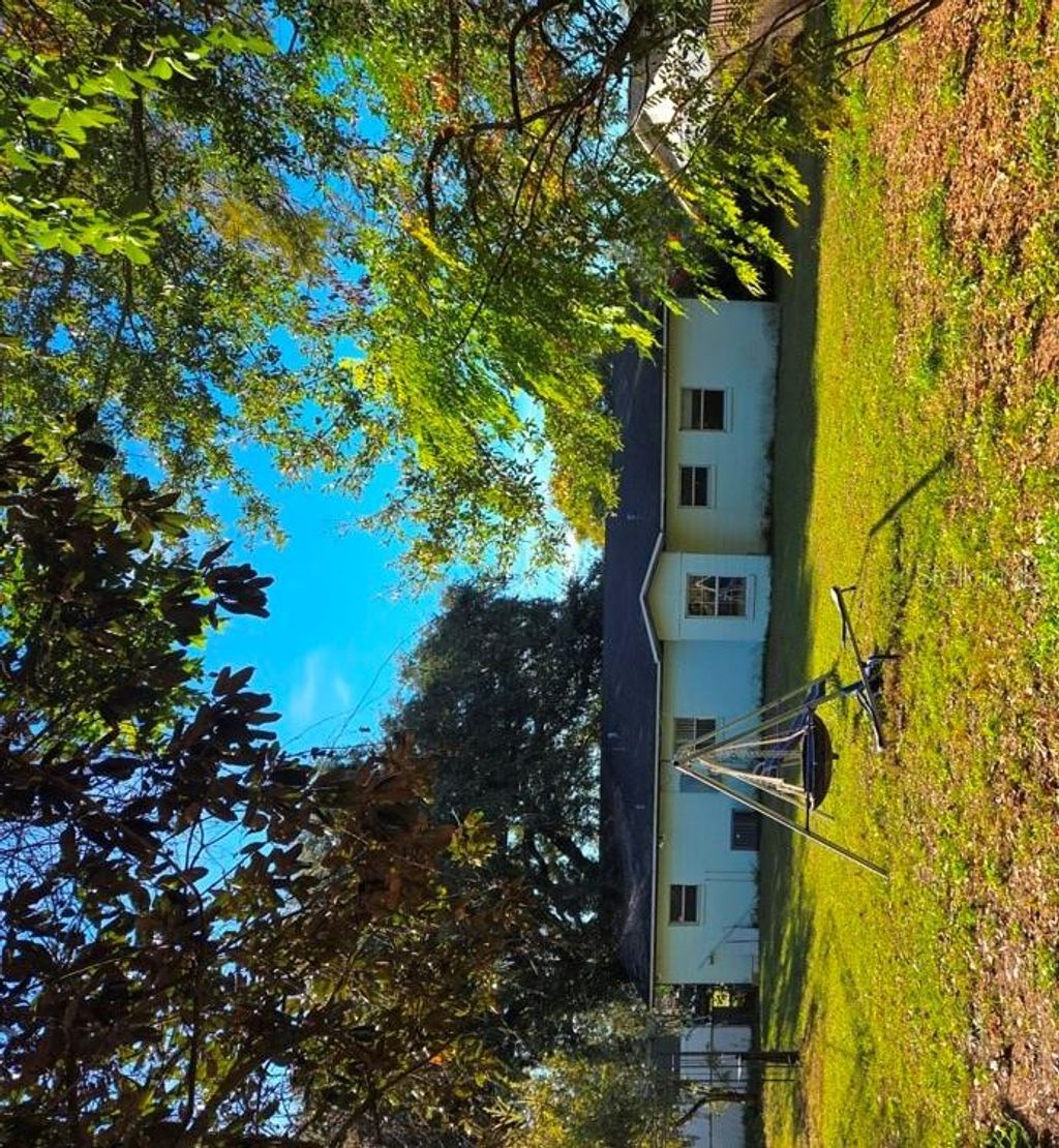 Photo of 1045 Princewood Drive, Orlando, FL 32810 (MLS # O6371327)