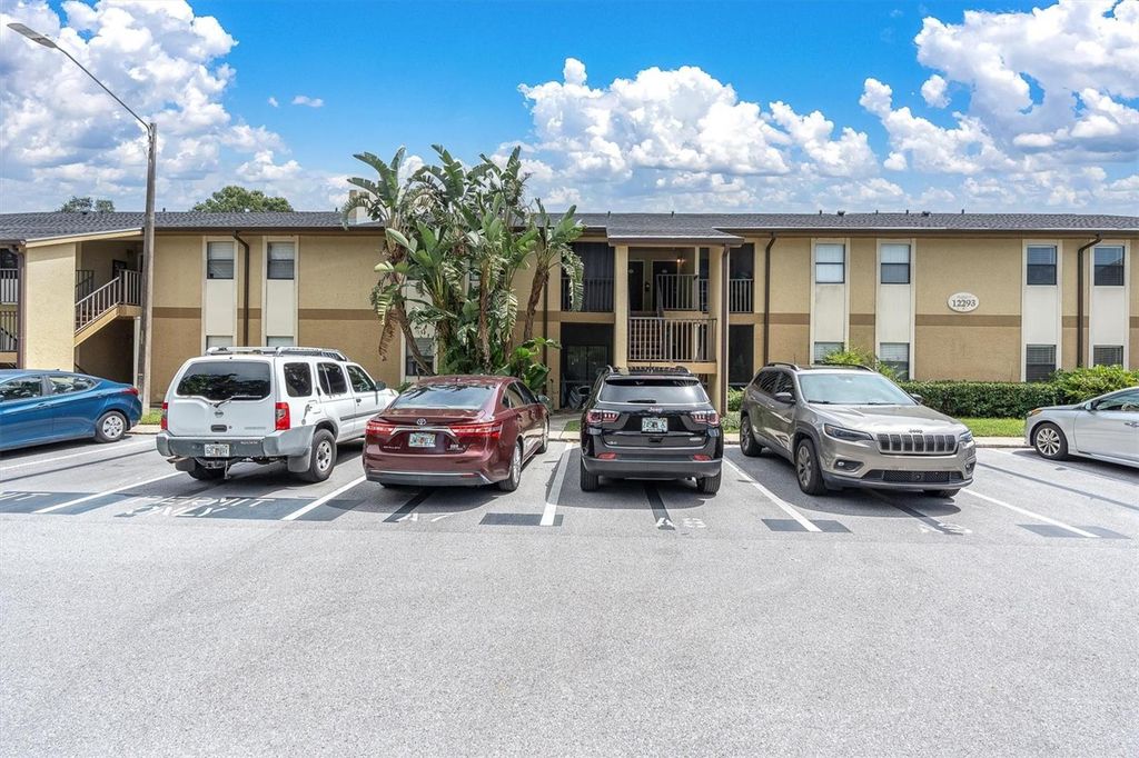 Photo of 12293 Sailwinds Drive #104, Largo, FL 33773 (MLS # TB8408793)