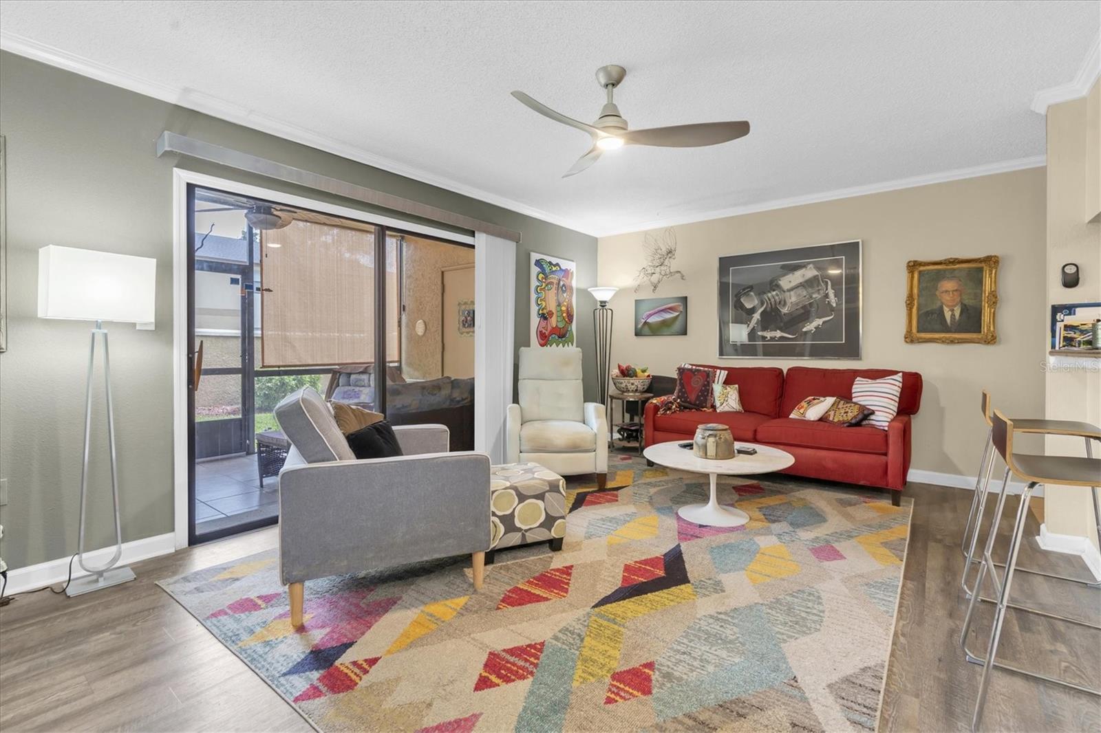 Ground-floor 3BR/2BA condo in the highly sought-after Bella Vista community in Seminole! This NO STAIRS unit is ideally located next to the pool and dog park, with a private back patio entrance just steps from the resort-style pool and spa.
Inside, the spacious living room is filled with natural light, thanks to a wall of windows and a large sliding glass door that opens to the patio. The primary suite features an en-suite bathroom and its own private access to the outdoor space, offering a perfect blend of comfort and privacy.
Enjoy peace of mind with major updates, including a new roof, A/C (5 years old), water heater (2 years old), and washer & dryer (2 years old).
The Bella Vista community is packed with amenities designed for comfort and leisure. Residents can relax by the resort-style pool with a built-in grill area, ideal for weekend get-togethers. Scenic wooden docks throughout the property provide tranquil spots for fishing or unwinding by the water—each dock even includes its own grill for added enjoyment. The community also features sidewalks and walking paths, and the pet-friendly green spaces come with no weight restrictions, so all furry friends are welcome. The HOA covers exterior maintenance, water, sewer, trash, and lawn care, making it easy to enjoy a low-maintenance, Florida lifestyle.