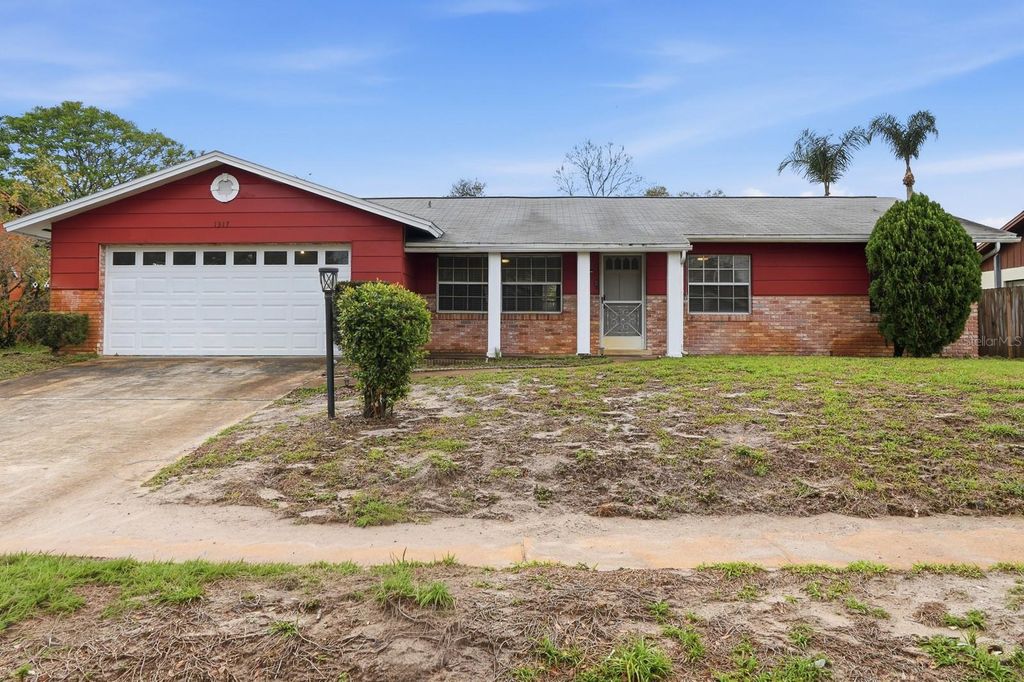 Photo of 1317 N Shangri La Drive, Daytona Beach, FL 32119 (MLS # V4947749)