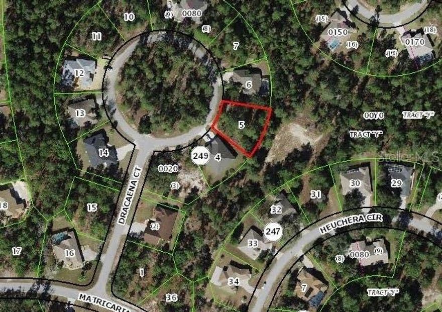 Buildable lot on a cul-de-sac in the desirable Sugarmill Woods Oak Village neighborhood in Homosassa. Surrounded by newer custom homes, this lot in in a prime location with no neighbors behind it, offering serenity and privacy. It is high and dry and is not in a flood zone. Electricity, public water and sewer are available. With a tranquil location close to the Oak Village Sports Complex (pool, tennis, playground and pickleball), it is only 5 minutes from Publix, Walgreens and other shopping. This unique location provides easy access to US-98 and the Suncoast Parkway and is only 50 minutes from Tampa International Airport.  Perfect for the nature lover, the Suncoast Bike Trail, Homosassa River, Chassahowitzka River, Homosassa Springs Wildlife Park and Withlacoochee State Forest are just minutes away, along with numerous crystal-clear springs and the Gulf. Homosassa was recently named one of the top places to retire in the United States due to its Old Florida charm, low cost of living and modern amenities. Come take a look today!