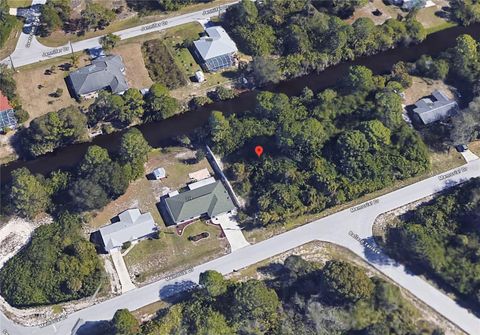Photo of 7236 Memorial Drive, Port Charlotte, FL 33981 (MLS # C7517155)