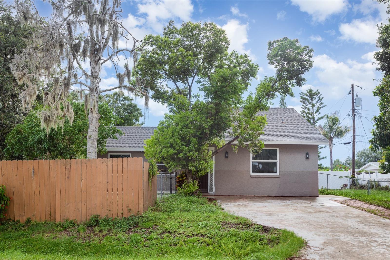 Charming 3-Bedroom Home on a Spacious Corner Lot Across from Bee Ridge Park. Welcome to this delightful 3-bedroom, 2-bathroom residence nestled beneath a canopy of mature trees on an expansive corner lot, just steps from the scenic Bee Ridge Park. With no HOA and no CDD, this property offers exceptional flexibility and freedom for homeowners. Perfectly suited for boat or trailer owners—or anyone who simply enjoys extra outdoor space— the generous yard provides room for all your lifestyle needs. A sizeable storage shed adds convenience, while the split-bedroom floor plan ensures privacy for family or guests. Inside, a spacious indoor laundry room enhances everyday living, and the enclosed lanai offers an ideal space for entertaining or relaxing in comfort. Cozy, charming, and full of potential, this home makes a wonderful primary residence or investment opportunity. Ideally located less than five miles from the world-famous Siesta Key Beach and with easy access to US-41 and I-75, you'll enjoy effortless proximity to top-rated shopping, dining, medical facilities, and recreation. Don't miss your chance to own this quintessential Florida gem—schedule your private tour today! Some photos may be virtually staged.