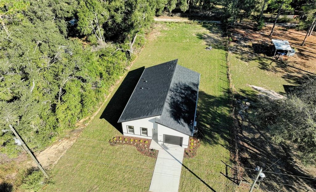 Photo of 13527 SW 100th Lane, Dunnellon, FL 34432 (MLS # O6404685)
