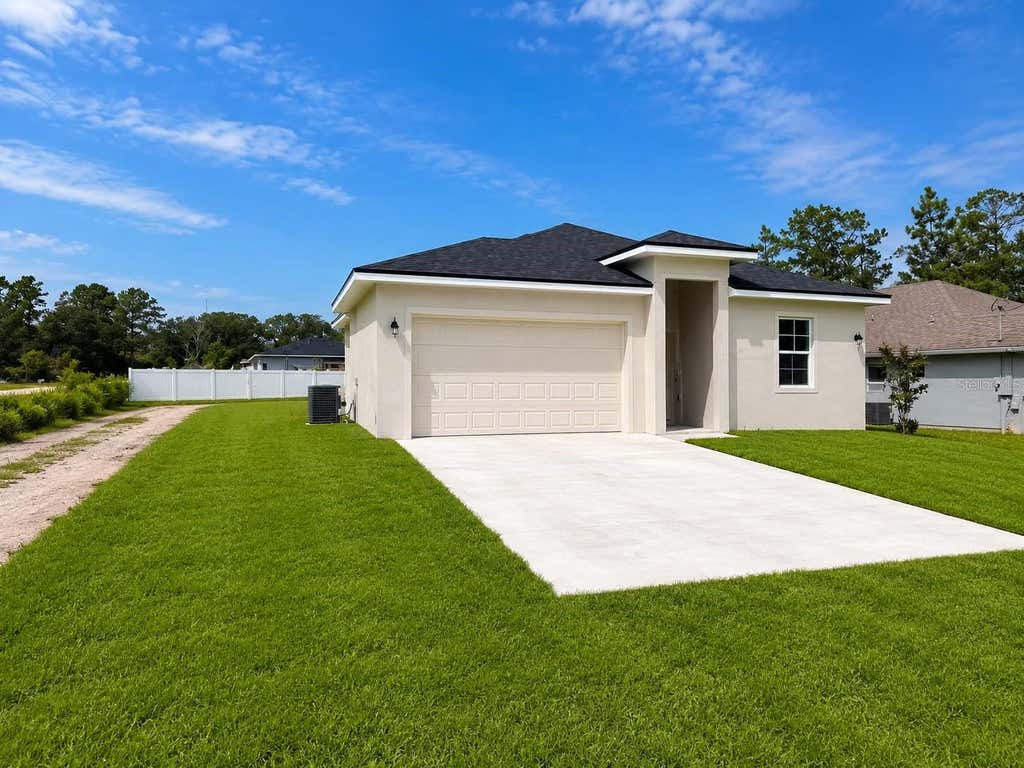 Photo of 1306 East Parkway, Deland, FL 32724 (MLS # O6433487)