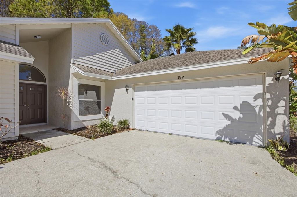 Photo of 812 Crestridge Drive, Tarpon Springs, FL 34688 (MLS # TB8485378)