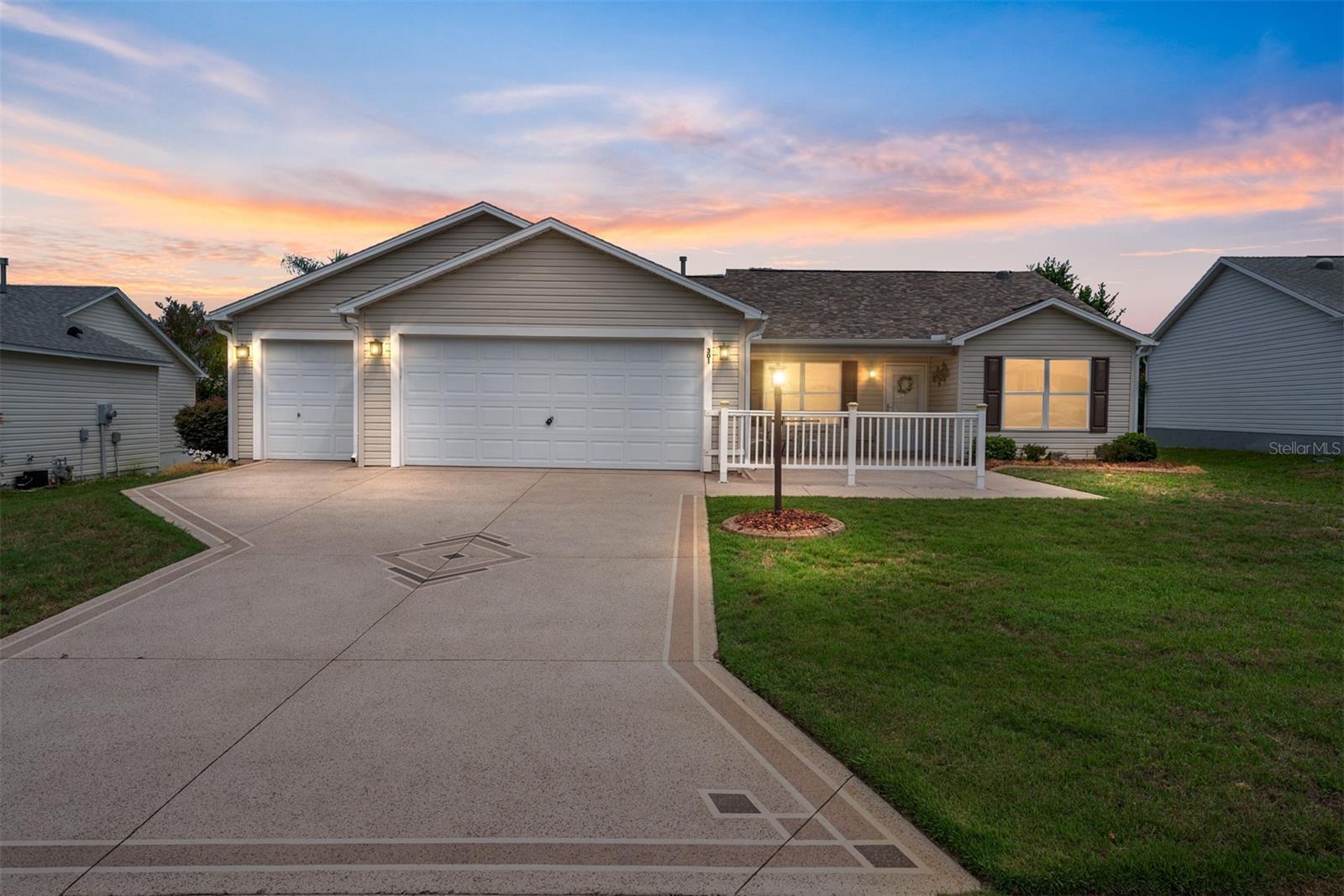 *** ROOF 2023***Welcome to this stunning AMARILLO model located in the highly sought-after Village of Caroline, just minutes from the vibrant Sumter Landing Square. This beautifully maintained home exudes charm from the moment you arrive, featuring a welcoming front patio perfect for relaxing or entertaining. Inside, you’ll find gorgeous luxury vinyl plank flooring throughout the main living areas, crown molding that adds an elegant touch, and a bright, open floor plan designed for comfortable living. The kitchen boasts a gas stove, ideal for the home chef, and the home offers ample space with a two-car garage plus a dedicated golf cart garage. Whether you're looking to enjoy the active Villages lifestyle or simply unwind in comfort, this home has it all. Conveniently located near CR 466, you're just moments away from top-notch dining, shopping, and entertainment options. As a special bonus, the golf cart is included if full-price —making this home truly a Villager's dream!