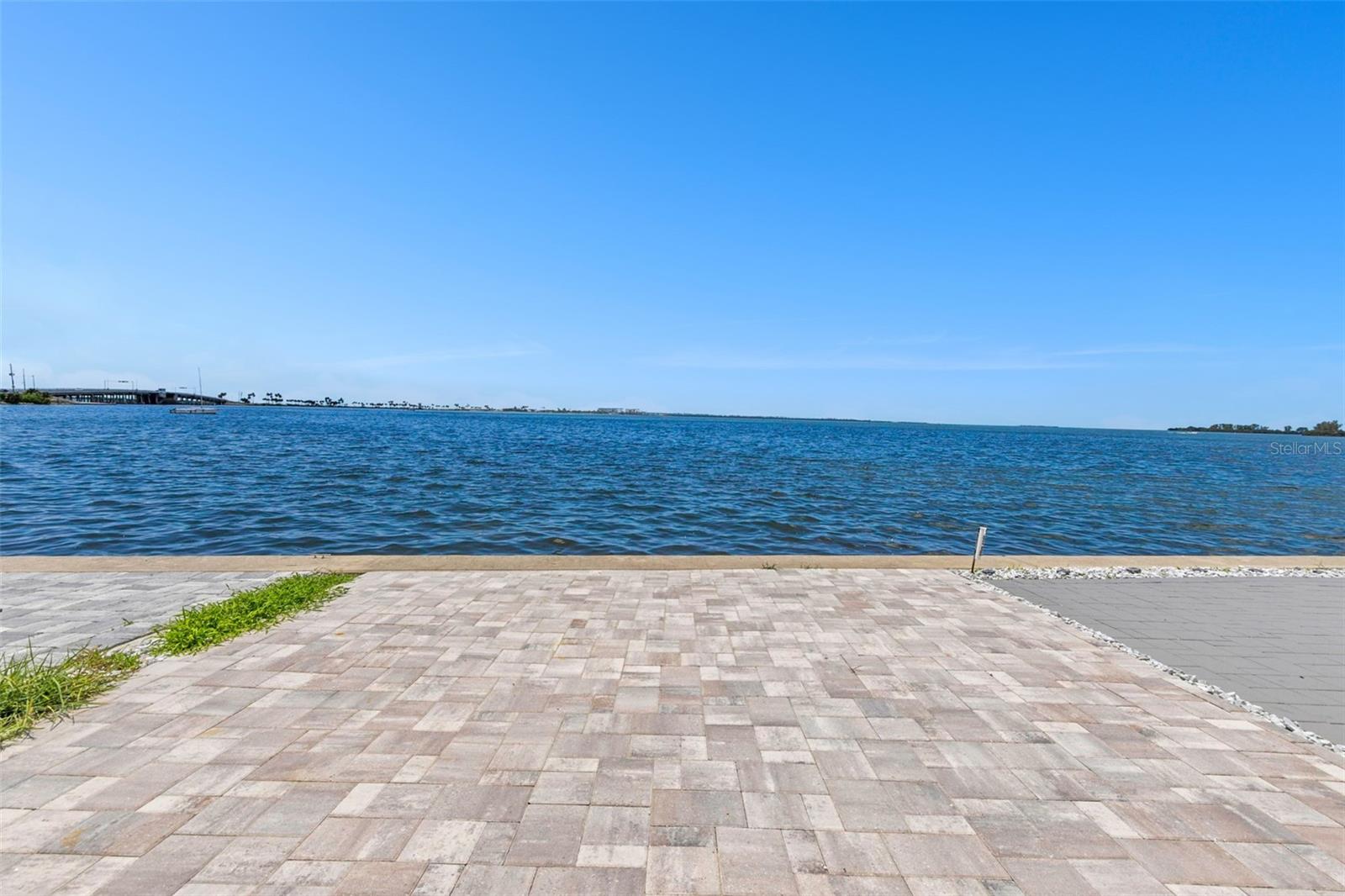 Waterfront Paradise on Dunedin Causeway – NO HOA, NO Monthly Fees!
Welcome to Waterfront Paradise—a rare and beautifully renovated 2-bedroom, 2-bath townhome on exclusive Ward Island, one of Dunedin’s most sought-after coastal communities. This stunning property offers NO HOA, NO CDD, and NO monthly fees, giving you true ownership freedom in a location where luxury meets lifestyle. Live the Ultimate Coastal Dream.
Wake up to dolphins and manatees right outside your door. Spend your days kayaking, paddleboarding, or relaxing at the beach, and end each evening with mesmerizing west-facing sunsets over the Gulf of Mexico and Intracoastal Waterway—all from your private waterfront retreat.
Professionally Renovated with Luxury Finishes.
Every inch of this home has been thoughtfully upgraded with timeless coastal elegance and quality materials:
Brand-new impact-rated windows & sliders (upstairs and down).
Wood-look luxury vinyl plank tile flooring throughout.
Modern kitchen with granite countertops, shaker cabinetry, and stainless steel appliances.
Two updated bathrooms with stylish vanities, tiled showers/tub, and sleek fixtures.
Indoor laundry room with washer & dryer.
New waterfront screened porch plus a private balcony off the master suite.
New stair railing, ceiling fans, and fresh coastal interior paint. Constructed of solid concrete block, this home also includes a tankless water heater (2021), seawall cap (2004), and new central A/C (2025)—ensuring lasting comfort and peace of mind.
Prime Walkable Location.
Perfectly positioned just steps from the water and local favorites:
Short walk to Frenchy’s Outpost, Hurricane Eddie’s, and Marker 1 Marina.
Minutes to Honeymoon Island State Park and award-winning Caladesi Island Beach.
Easy access to Downtown Dunedin, Clearwater Beach, and the scenic Pinellas Trail.
Close to restaurants, shops, banks, pharmacies, and daily conveniences.
Rare Ownership Opportunity.
Zoned as single-family attached townhomes, this property includes land ownership—a rare feature in such a prime waterfront setting. Surrounded by new $1.6M+ luxury construction, this home offers exceptional long-term value whether you're seeking a:
Full-time luxury residence. Smart investment in Florida’s thriving Gulf Coast market.
Live Where Others Vacation.
This is more than a home—it’s a lifestyle. With breathtaking views, no restrictions, and walkable access to everything Dunedin has, this property truly is one-of-a-kind.