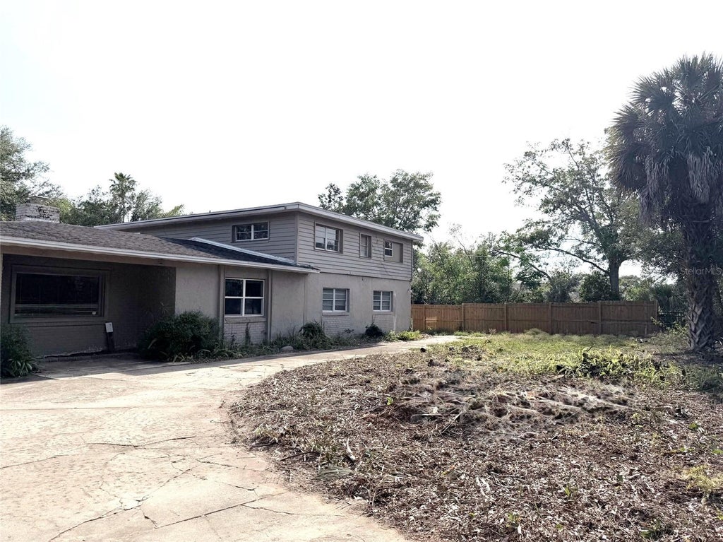 Photo of 7200 Grace Road, Orlando, FL 32819 (MLS # O6450048)