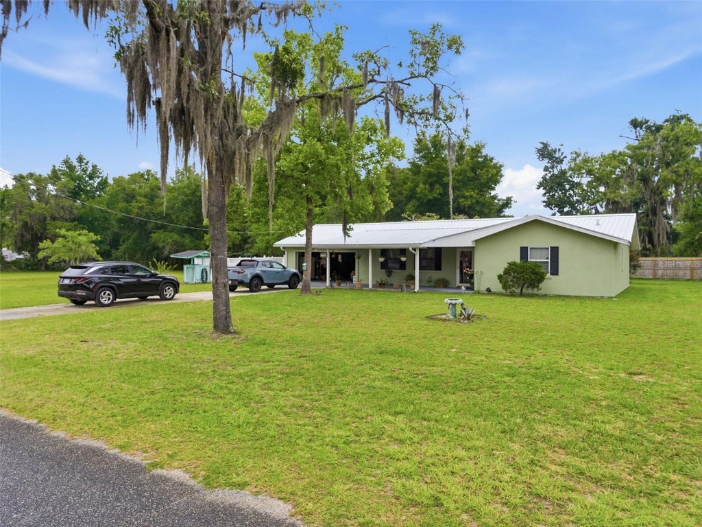Photo of 334 7th Way, Interlachen, FL 32148 (MLS # A4696721)
