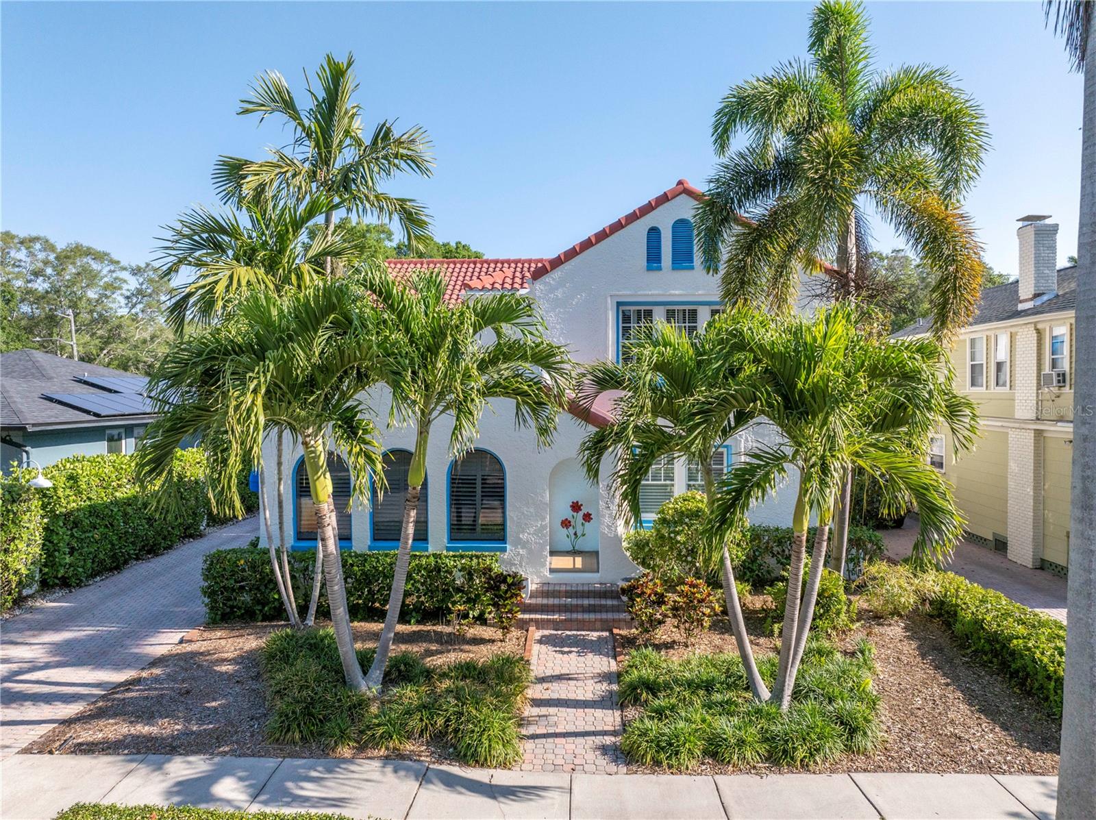 Nestled in the heart of the coveted Historic Old Northeast neighborhood, this stunning 1930 built Mediterranean home offers a luxurious blend of classic charm and modern sophistication. The Historic Old Northeast is a leafy residential area with brick streets and waterfront green spaces. Choose your activity- jogging, boating, city events, museums, endless restaurants, shopping retailers. The home has only been owned by 3 families in its 94yrs which makes it perfect for Buyers looking for their next forever home and a sound investment in a historical neighborhood. The driveway with pavers offers plenty of off street parking and brings you to the over 3500 sf of heated living space. The Exterior of the home was constructed from masonry concrete block and stucco /CB reclad. As you enter the home through the double french doors into the foyer you are greeted by the expansive living room perfect for large gatherings and entertaining. The gas fireplace warms the occasional nights. As you pass Through the custom glass etched double doors you will enter into the family room. Glass french doors allow passage to the outdoor covered lanai which leads you out to a backyard oasis with a private pool which was recently resurfaced. The pool deck and lanai were updated with travertine flooring. Off the pool is an almost 400 sf Guest Ensuite cooled by a mini split a/c in 2018. The Guest suite also has a full bath and kitchenette. The galley kitchen is accessible from the pool and perfectly placed in the home to provide privacy as you prepare special meals while family and friends can enjoy the downstairs living space. The kitchen has 42" wood cabinets, stainless steel appliances including a gas oven and stove. Off the kitchen is a breakfast nook with original cabinetry to display those special collected items. For more formal entertaining, there is an oversized private dining room which has a built-in cabinet buffet and is surrounded by walls of windows covered by plantation shutters.There is a half bath for convenience on the first floor and an indoor laundry room with a pantry closet. All bedrooms are upstairs and the Primary suite allows plenty of space for furnishings including seating. The walk-in closet has custom shelving for organizing.The bedroom opens out to a roof top terrace that could be designed and furnished for morning coffee or taking in a great book. The Primary bathroom was updated in 2018 and features a walk-in shower, Jet tub, double vanity with quartz top and shaker painted cabinets. The 2ndary bedrooms are joined by a Jack and Jill bathroom which was updated in 2018 with quartz top vanity and jet tub shower combination. Although there have been many modern updates, there are remaining old world charm finishes like original hardwood floors both oak and pine, original interior doors with glass door knobs, built in carpentry, volume ceilings, and more...Some dates of other improvemets are: The concrete tile/glazed roof 2017, flat roofs replaced in 2017, Awnings 2017, Exterior paint 2016, 3 access points to crawl space, home secured against wildlife, Windows updated in 2019, 2 a/c systems new in 2014 & 2017, Gas tankless water heater, Fresh interior paint in 2021, designer window treatments 2021. The home is easy to view and we welcome you for a visit!