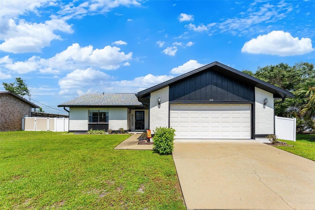 Photo of 604 Tradewinds Drive, Deltona, FL 32738 (MLS # O6444855)