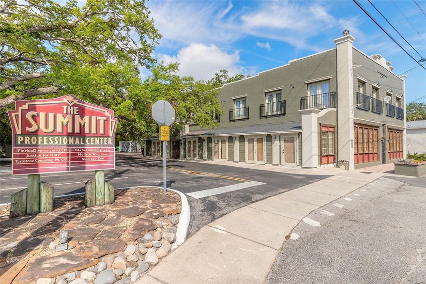 The Summit Professional Center is a beautifully updated, historic-designated building that blends classic charm with modern functionality. Located directly across from Sunrise Park, a scenic riverfront space with public dock and additional parking, the property offers both convenience and a peaceful natural setting. Designed with feng shui principles to promote balance, harmony, and success, this exceptional property is truly one of a kind. The building showcases stunning craftsmanship, with preserved oak flooring, elegant craftsman-style arches, rich wainscoting, and a striking herringbone tile design throughout the hallways. Every element has been professionally designed to enhance the flow of energy and create a welcoming, tranquil environment. The building is in impeccable condition, with all major systems meticulously updated, including plumbing, electrical, roof, windows, and added insulation. Constructed with durable double block materials and featuring an underground water retention system, the property sits high and dry, ensuring lasting protection and peace of mind. Mature trees surround the property, enhancing its beauty and providing natural shade, while abundant on-site parking and additional public parking across the street at Sunrise Park make access easy and convenient. River and park views further elevate the serene, inspiring atmosphere of this unique professional center. The first floor currently operates as a legal office, offering a flexible layout with multiple large and small office spaces, conference rooms, file rooms, and multiple entry and exit points. The second floor is fully leased with five professional units, each thoughtfully designed to maintain the building's historic character. Additionally, there is an owner's suite featuring a full kitchen, bathroom, living area, and gorgeous river views providing a perfect private retreat or additional rental income. The building offers a total of nine bathrooms, including two full baths with showers, three kitchens or kitchenettes, and two laundry areas, accommodating a wide range of professional uses. With the potential to create up to 15 rental units, The Summit Professional Center offers exceptional flexibility for both owner-occupants and investors. Whether you envision running your own business while earning passive income or seeking a fully operational, low-maintenance investment property, The Summit delivers unmatched potential. Its combination of historic charm, updated infrastructure, beautiful surroundings, and thoughtful design make it a true gem in today's commercial real estate market.