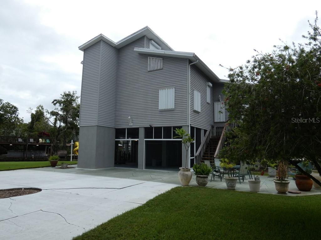 This home offers 3 bedrooms, 2 bathrooms, an office, and a 1-car garage. The second floor features two patios, while the first floor boasts a gigantic covered patio with 18-foot ceilings and a wood-burning fireplace. The property sits on .31 of an acre with 301 feet of frontage on the Weeki Wachee River, complete with a seawall. From this location, you can reach the Gulf in just 8 minutes at idle speed.
Whether you enjoy paddleboarding, kayaking, jet skiing, or boating, this home provides endless opportunities for water activities, with breathtaking views from every angle. Originally three separate lots, all are now included with the purchase, making this a truly unique offering.
Convenience is another highlight: the property is less than 60 miles from St. Pete Beach, named the #1 Beach in America and the 5th Best Beach in the World. It is also less than 79 miles from Walt Disney World and under 50 miles from Tampa International Airport.
Please take a moment to view the two videos: Tour 1 and Tour 2.