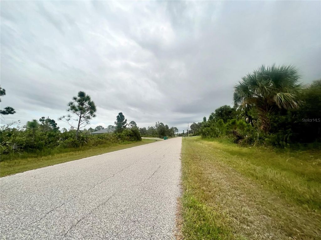 Photo of 12113 Snow Bird Avenue, Port Charlotte, FL 33981 (MLS # C7506756)