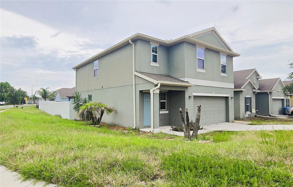 Photo of 1411 Woodlark Drive, Haines City, FL 33844 (MLS # O6428692)