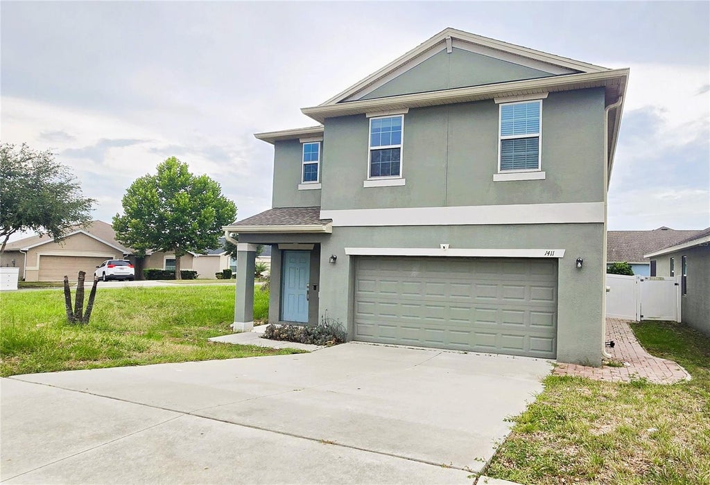 Photo of 1411 Woodlark Drive, Haines City, FL 33844 (MLS # O6428692)