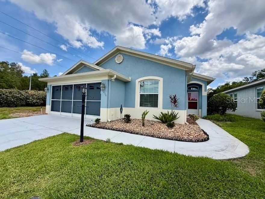 TIMBER GREENS* a sought after GATED 55+ ACTIVE GOLF COMMUNITY. 2003 Single family home with nearly 1700sqft located on a most private quiet cul-de-sac which backs up to a Pond. NO EVACUATION ZONE. Monthly Fee of $315 includes-Cable, High Speed Internet, Trash pickup, Lawn care, sprinkler watering, paint every 5-6yrs, security gate, rec center use and activities. 
As you enter you are greeted in BEAUTIFUL BAMBOO floors. This warm gently used block construction 3-bedroom 2- Full bath SPLIT PLAN home offers a wonderful layout which works well with guests and entertaining. ALL Rooms are generously sized.
Enjoy the open kitchen concept with a breakfast bar, eat-in area, and a separate Pantry. Master bedroom offers walk-in Closet, double sink vanity, garden tub and separate shower. A dedicated Dining area leads out the slider door to an EXTENDED SIZED TRANQUIL SCREENED-IN PATIO the full width of the home. *BONUS- screened in garage too! > open the garage, the back slider patio door, and the BREEZE is superb! (ROOF 2021, AC 2021, IMPACT WINDOWS 2022, Extended screened patio 2017 and all appliances are NEWER). With Starkey Wilderness Preserve & Trail just across the way and no rear neighbor, nature abounds. you'll see Egrets in the lawn, plenty types of birds, and squirrels too. Enjoy a fill of nature with its unique sounds and quietness. Then for entertainment, walk or ride over to the clubhouse see your neighbors for a bite to eat, swim or one of the many activities.

Timber Greens is successful, prestigious, and a sought-after golf course retirement community along Florida’s west Nature Coast. Offering a lifestyle complemented by outstanding amenities. Enjoy a pristine 18-hole golf course; clubhouse; swimming pool with hot tub, tennis, pickleball, bocce, and shuffleboard. A fully equipped fitness center and a full-service restaurant and bar finalize it all, giving you that RESORT STYLE.
Timber Greens also offers a full calendar of social events and activities for residents. The community features seven miles of beautifully landscaped and cared for neighborhood roads and sidewalks—perfect for walking, running, or biking—with convenient access to scenic Starkey Wilderness Park.
Convenient to shopping, major roads, medical facilities, restaurants and 40 Min drive to Tampa International Airport. about 40 min to Dunedin Beach and Honeymoon Island.