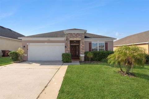 Photo of 1038 Suffragette Circle, Haines City, FL 33844 (MLS # O6363173)