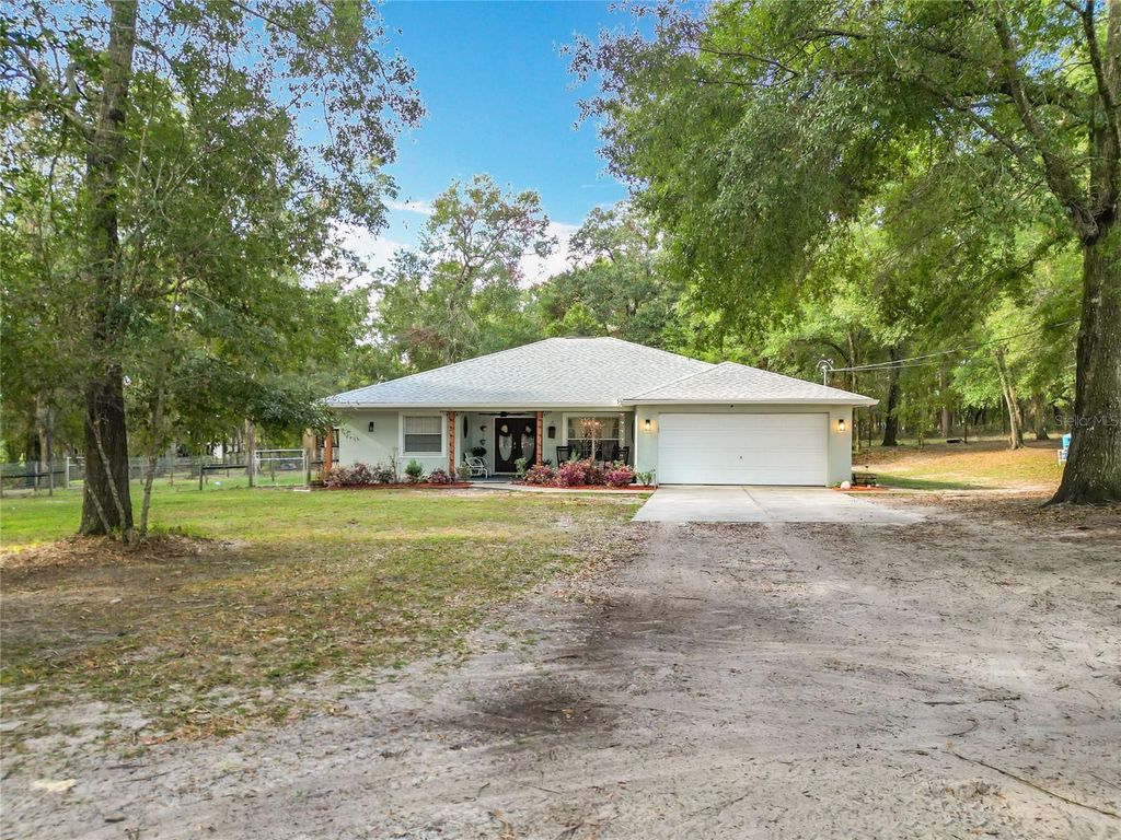 Photo of 8477 Foxfire Road, Brooksville, FL 34613 (MLS # OM707549)