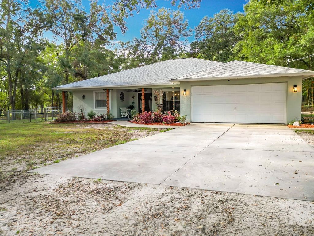 Photo of 8477 Foxfire Road, Brooksville, FL 34613 (MLS # OM707549)