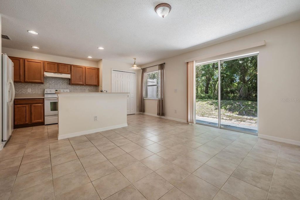 Photo of 4522 Winding River Way, Land O Lakes, FL 34639 (MLS # TB8445870)