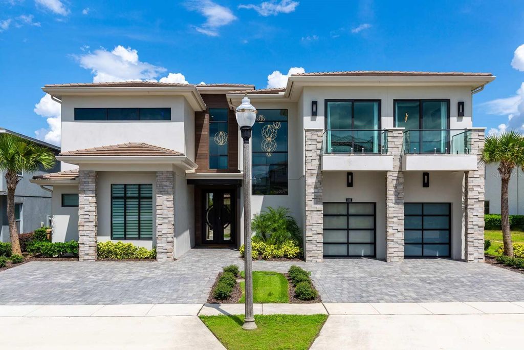 Photo of 751 Golden Bear Drive, Reunion, FL 34747 (MLS # O6363480)