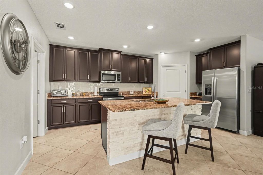 Photo of 10231 Echo Dock Loop, San Antonio, FL 33576 (MLS # TB8488273)