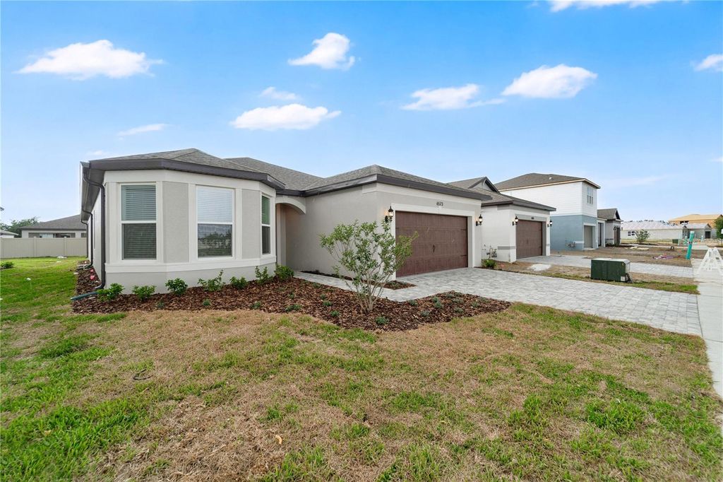Photo of 6573 Asbury Barnes Lane, Wesley Chapel, FL 33545 (MLS # O6398230)