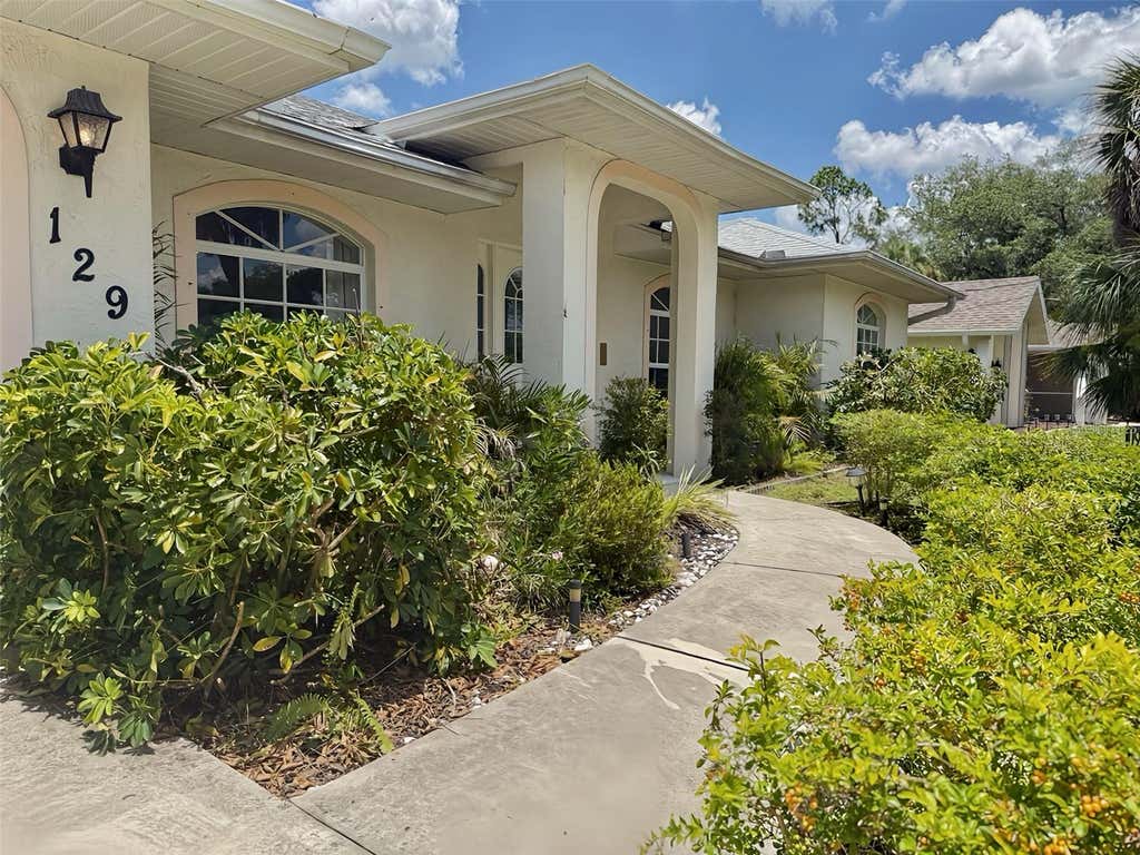 Photo of 129 Fountain Street, Port Charlotte, FL 33953 (MLS # A4699043)