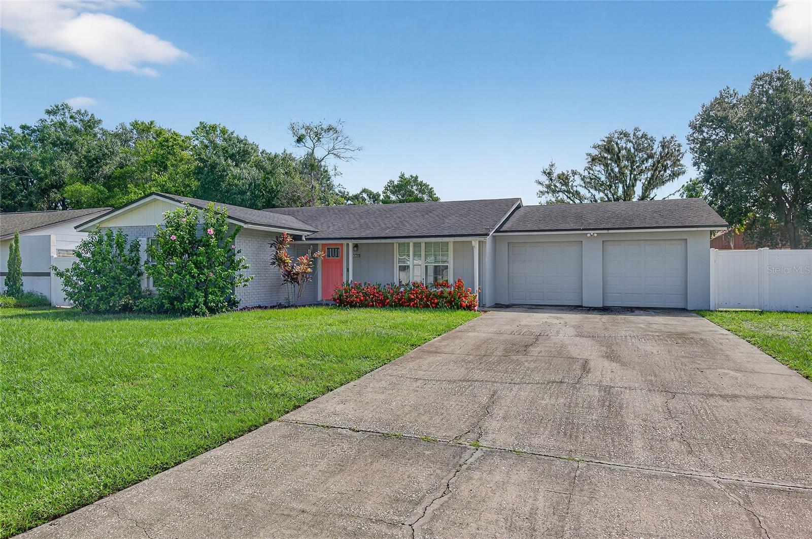 Welcome to 18303 Dolly Brook Lane, a beautifully updated 3-bedroom, 2-bathroom home in the well-established community of Bonniebrook Estates. Situated on a spacious .20-acre lot in a great neighborhood with no HOA or CDD, this home offers affordability, freedom, and modern comforts. From the inviting front porch, step inside to an open floorplan featuring wood-look ceramic tile throughout, creating a warm and practical living space. The spacious living and dining areas are connected to a tastefully renovated kitchen featuring stone countertops, modern cabinetry, subway tile backsplash, and a pantry. Both bathrooms have also been updated with new cabinets and stone countertops, and the primary bedroom features a convenient en-suite with a walk-in shower. Enjoy the large backyard, accessible through French doors off the dining room, perfect for relaxing or hosting friends. The oversized 2-car garage and extra-long driveway provide plenty of parking and storage for all of your toys. Major systems are worry-free: the roof, AC, and water heater were all replaced in 2017, and a new well was installed in 2024, ensuring peace of mind for years to come. Located in a quiet, established neighborhood with easy access to shopping, dining, and major roadways, this move-in ready gem combines quality updates with everyday functionality. Whether you're a first-time buyer, downsizing, or investing, this property offers the rare opportunity to own a beautiful home with no additional fees. Schedule your private showing today.