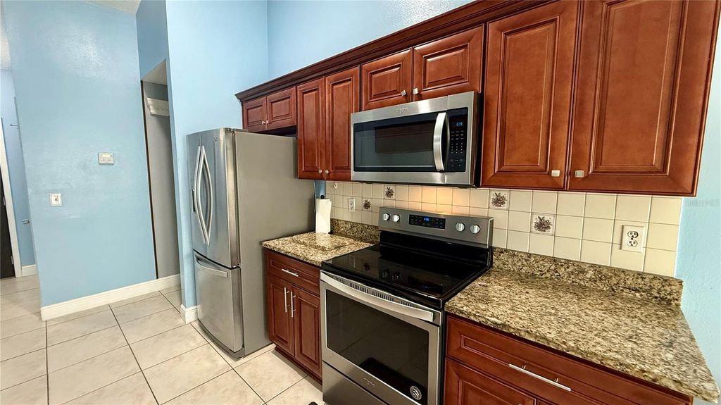 Photo of 2482 Quail Run Boulevard, Kissimmee, FL 34744 (MLS # S5143354)