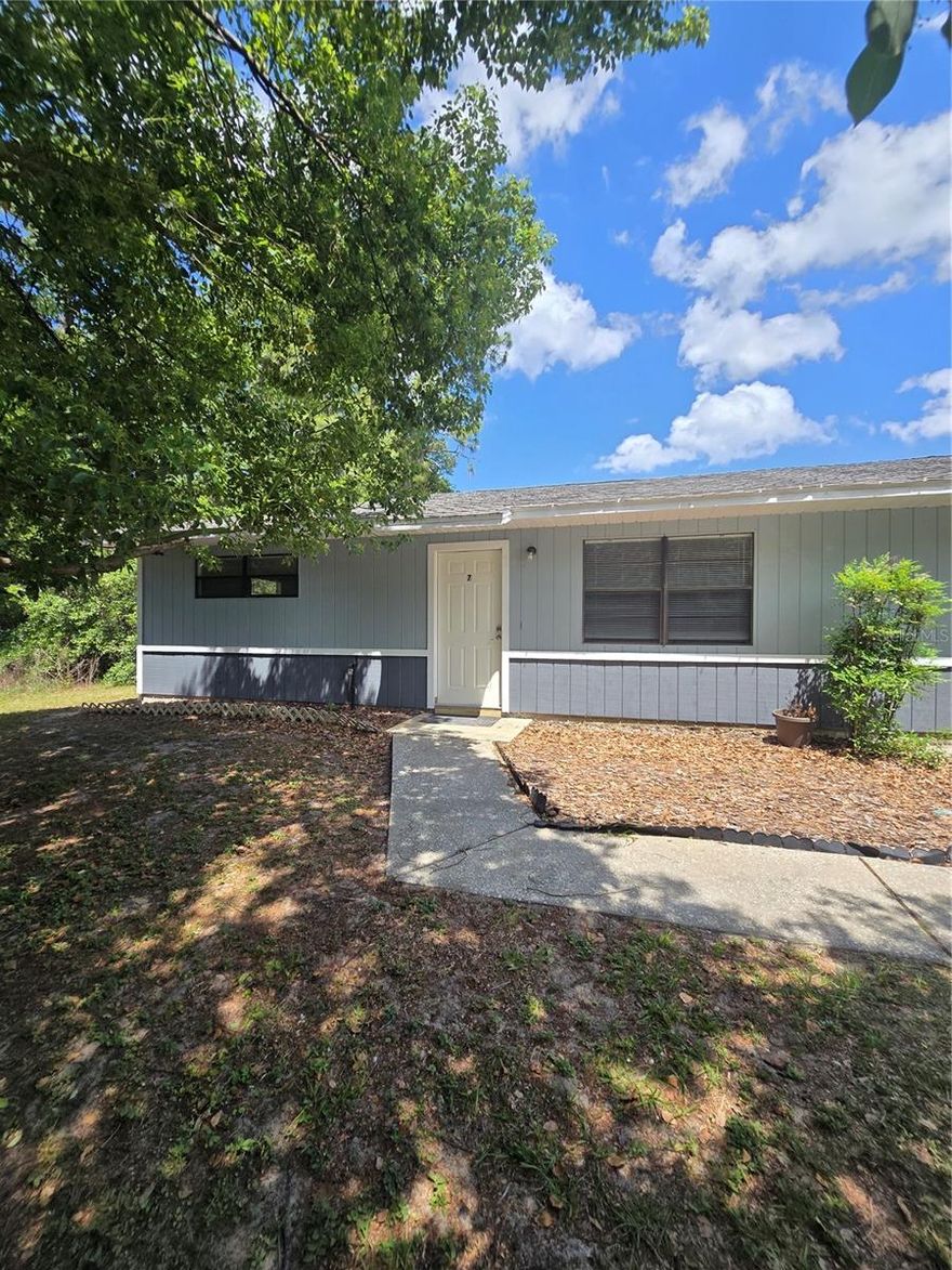Welcome to this bright and inviting 2-bedroom home featuring a spacious eat-in kitchen with ceramic tile flooring, ample cabinet space, a pantry, and direct access to the patio. Enjoy the comfort of two oversized bedrooms and a large bathroom with a full tub. The living areas have new laminate flooring, there are window blinds throughout, and the home is freshly painted. Stay comfortable year-round with central A/C and heat. You'll also appreciate the convenience of in-unit washer and dryer hookups in your own dedicated laundry and storage room. Relax in your tree-shaded yard with maintenance provided. *Bruised credit ok! For rent $1,205/mo. Rent includes water, septic, garbage, and lawn care.* Pets: Small pets, 25 lbs or less. Dogs: No aggressive breeds as defined by the insurance company. Limit 2 pets, $25 per month for most breeds. *Total Cost to Move-In: $ 2,800.00 plus pet fee, if applicable, includes first month's rent. *Application Process: $70 Total per adult to apply. All adults must apply.