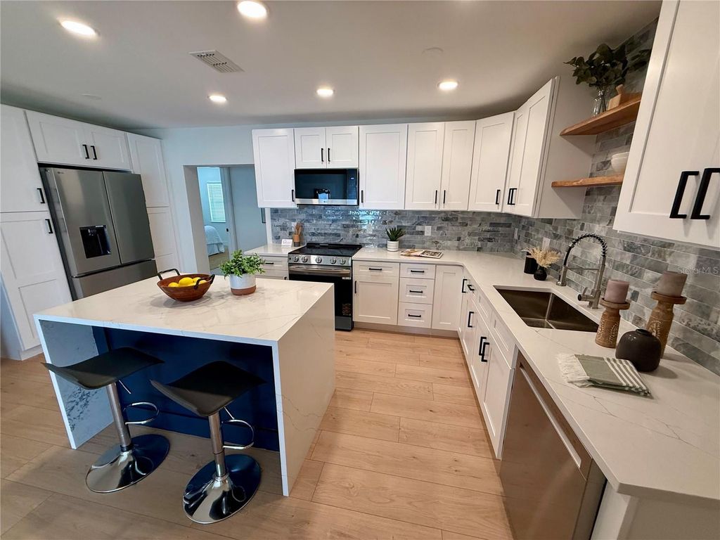 Photo of 1824 Douglas Avenue, Dunedin, FL 34698 (MLS # TB8503351)