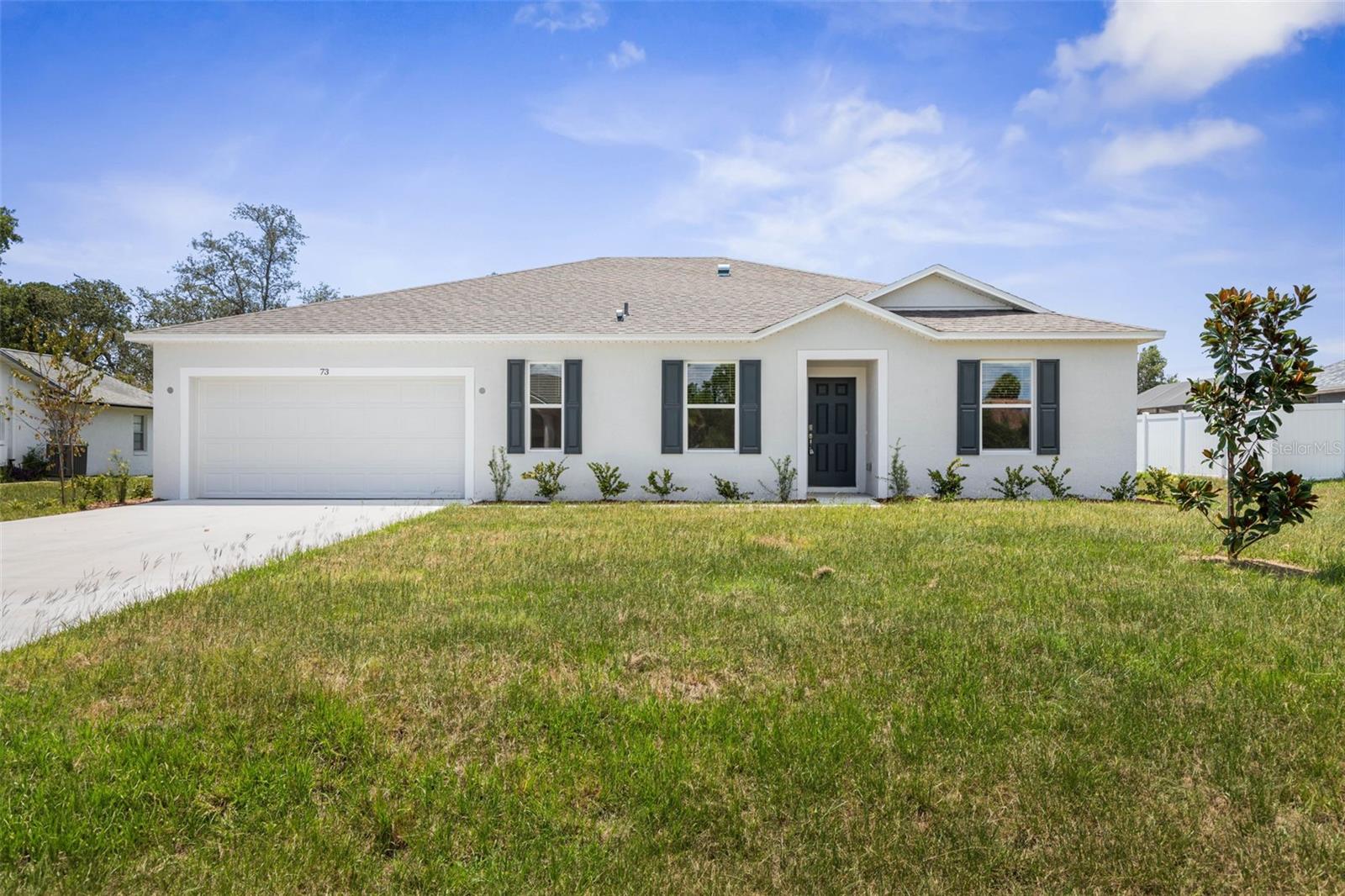 Brand new and ready for its first residents! This spacious 4-bedroom, 2-bathroom home with a versatile den offers modern living at its finest. Enjoy an open floor plan perfect for entertaining or relaxing, featuring a stylish kitchen with stainless steel appliances, a large center island, and ample cabinet space. Luxury vinyl plank flooring runs throughout the main living areas, with cozy carpet in the bedrooms. The primary suite includes a private en suite bathroom for added comfort. Thoughtfully designed with functionality and flow, this home offers plenty of space for work, play, and everyday living. Conveniently located near shopping, dining, schools, golf, and with easy access to US-1 and I-95.