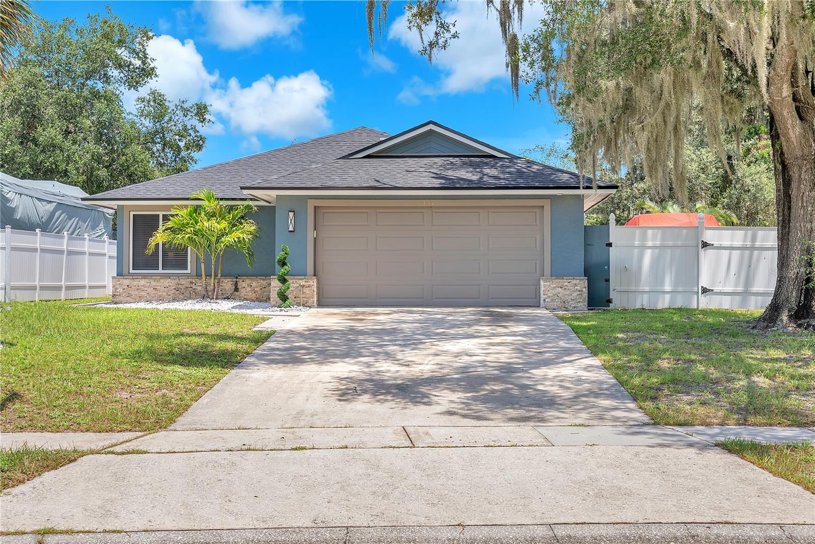 Welcome to this beautifully updated, move-in ready, fully furnished 3-bedroom, 2-bath single-family home — complete with furniture, décor, and appliances! Located in the desirable Sunrise community of Winter Springs. The house has an enclosed rear patio an additional 4th air conditioned space/room, offering flexible space for a gym, sun room or home office.
Set on an oversized 0.27-acre lot, this property offers exceptional indoor and outdoor living features for both comfort and functionality. The rear enclosed patio, equipped with new windows and a dedicated A/C system (2025), provides a versatile bonus space perfect for today’s lifestyle needs.
Inside, you’ll find new vinyl flooring, remodeled bathrooms (2022) with floating vanities, and a central 4-ton HVAC system replaced in 2020. The home also includes water pipe replacement (2022), an updated sprinkler system (2022), and fresh exterior paint (2025).
Step outside to a spacious fenced backyard, ideal for entertaining, featuring a custom gazebo with summer kitchen (2019). The pool was refinished in 2022 and comes with a sand filter replaced in 2019. The boiler-style water heater was replaced in 2017.
Perfect for RV, boat, or work trailer owners, the property offers two separate gated entrances with ample room for secure storage.
Located minutes from Starbucks, Lowes, Publix and Oviedo Mall, and top-rated schools — all within a community with very low HOA fees — this move-in ready home is offered as-is.
Don’t miss your chance to own this rare find with updates, flexibility, and space!