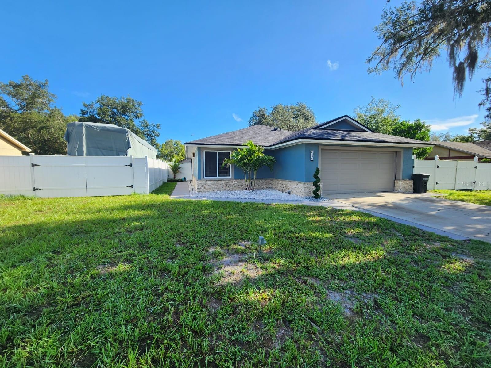 **PROFESSIONAL PICTURES COMING SOON**
Welcome to this beautifully updated 3-bedroom, 2-bath single-family home in the desirable Sunrise community of Winter Springs! Set on an oversized 0.27-acre lot, this home offers fresh vinyl flooring, remodeled bathrooms with floating vanities, and an air-conditioned rear porch with new windows and sliding doors. The spacious fenced backyard is perfect for entertaining, featuring a custom gazebo with a summer kitchen — plus ample space for an RV, boat, or recreational toys. Enjoy peace of mind with a brand-new 2025 roof and a recently refreshed landscape. Located just minutes from shopping, parks, and top-rated schools, and with very low HOA fees, this home is offered as-is and ready for its next chapter. Don’t miss it!