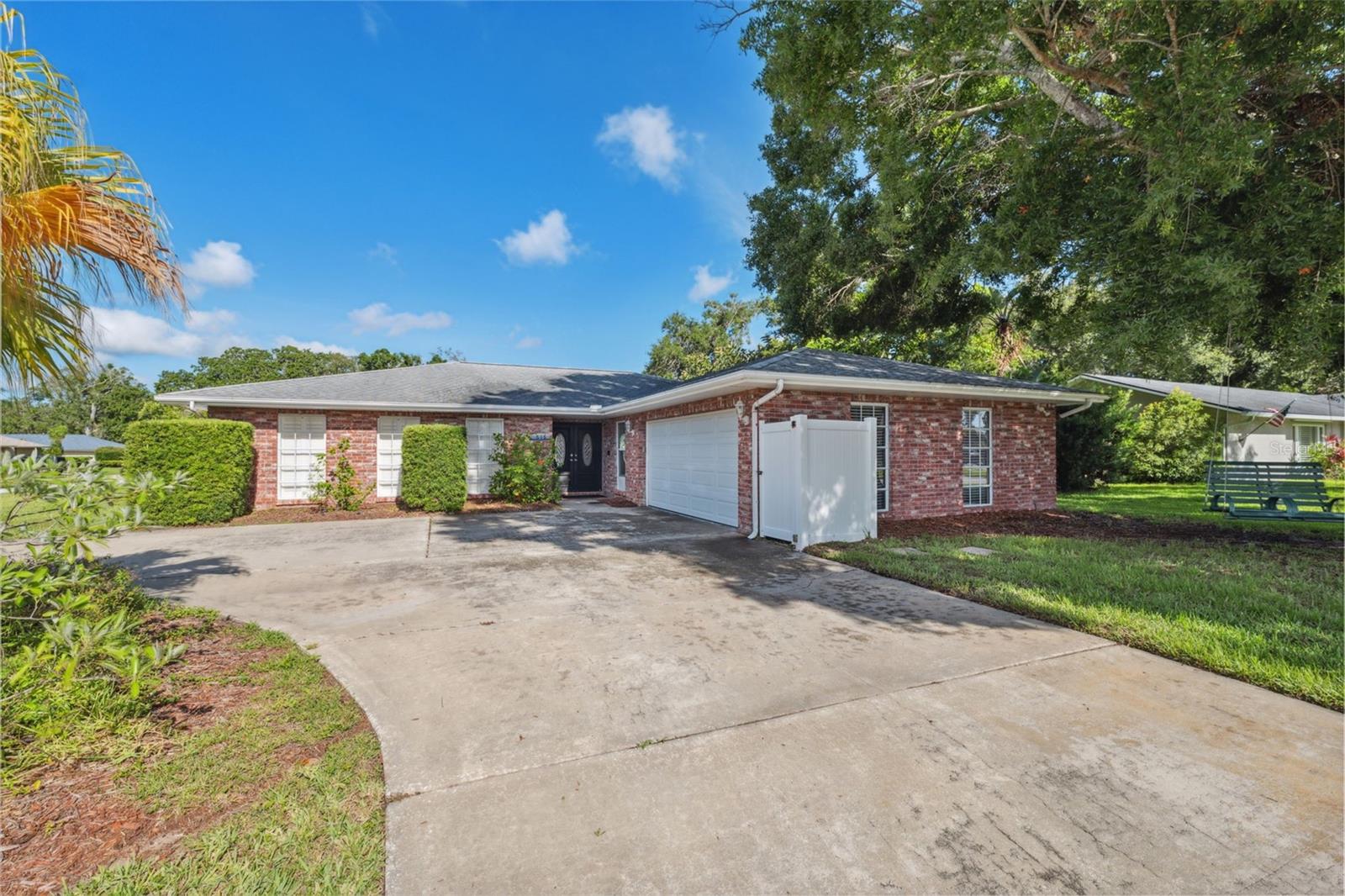 Welcome to this beautifully updated 3-bedroom, 2 & 1/2 -bath pool home in the desirable Westlake Village of Palm Harbor. As you enter the home, you'll appreciate the open floor plan with upgrades throughout. Features such as crown moldings, plantation shutters, custom ceramic tile, vaulted ceilings, ceiling fans, and recessed lighting. The modern kitchen has quality cabinetry, stainless appliances, including 2 ovens, a glass cooktop and a beautiful quartz island with plenty of seating space. The open yet charming living room features wood-look ceramic tile and a wood-burning fireplace. Spacious dining area with room for the largest of gatherings. There's an office or family room that has french doors near the entry which would be a desirable home office. The home also features a nicely sized laundry room with access to the yard. There's also a half bath that conveniently doubles as a pool bath. Two sets of French doors on either side of the fireplace lead out to the pool area. The heated pool and spa features a new gas pool heater, new propane tank, new variable speed pool pump, and a new filtration system. The private backyard features a six-foot vinyl fence and grassy areas with a rolling side gate large enough to park a small trailer, boat or golf cart. Next to the pool, you'll find a window-filled bonus/exercise room. The primary bedroom suite has multiple closets and a double-size shower with a rain showerhead and a bench seat. This home features a 2 car garage and plenty of off street parking with a circular driveway. Located on a quiet street that is golf cart-friendly, close to some of the best public schools, and zoned for Palm Harbor University. Downtown Palm Harbor, Downtown Dunedin, shopping, beaches, and Honeymoon Island State Park are all nearby. Westlake Village offers outstanding amenities, including a large swimming pool, pickleball, basketball, volleyball, tennis, playground and walking trails. Take advantage of the Florida lifestyle here in this desirable Westlake Village Home. Owner is Broker, contact soon for a private showing soon, before it's sold.
