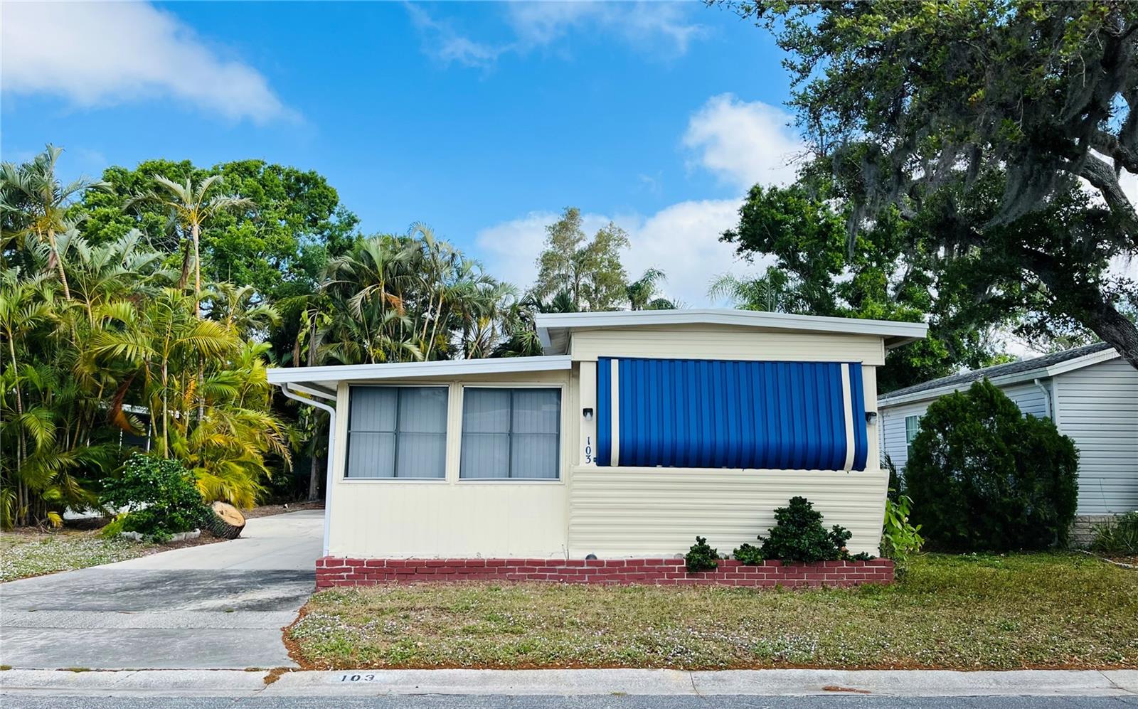PRICE REDUCED - on a DESIRABLE LOT with extra large private drive located in a charming gated community. This 1 bed 1.5 bath home is a great deal as the land value alone is close to the list price. The living room has new sheet rock ceiling and wicker furnishings. The kitchen, baths, and living room floors & subfloors have been updated and the inside breaker box is updated as well. The HVAC system installed in 2019. The 180sf Florida room gives additional living space making this a this fantastic choice for someone looking for a potential property to make their own.
Located in the ONLY Resident Owned Park in the City limits of Sarasota!! The gated 90 acre community boast low maintenance fee with its vast amenities starting with the large Clubhouse outfitted with a full commercial cook kitchen, event stage, audio/visual, dance floor, fitness room, activities hall, library with books/movies/puzzles and a pool table. Outside recreation includes an extra large heated pool with a handicap ramp, a spacious kidney shaped hot tub, ample tables and lounge chairs and remodeled shower rooms. Oak trees shade the beautiful park area, picnic tables and a community grill. Additional amenities to enjoy are the community putt putt course, bocce ball, ping pong, horse shoes and corn hole. Oakwood Manor is a highly social community with many groups and activities to be a part of. We are located adjacent to Legacy Trail and 12 new pickle ball courts managed by the City. Close to downtown, shopping and dining. Please note that Oakwood is a NO pet and NO motorcycle Park.