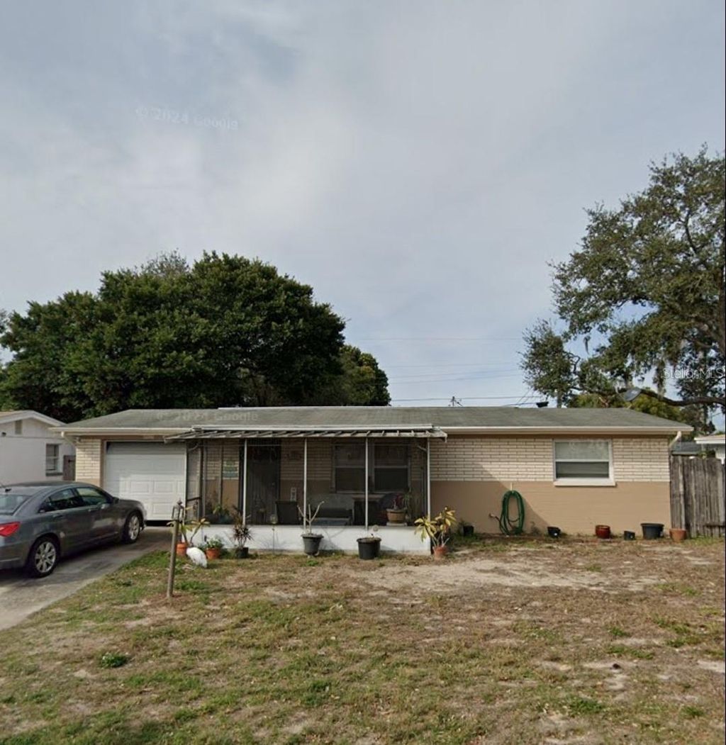 Photo of 2133 Holiday Drive, Holiday, FL 34691 (MLS # W7880105)