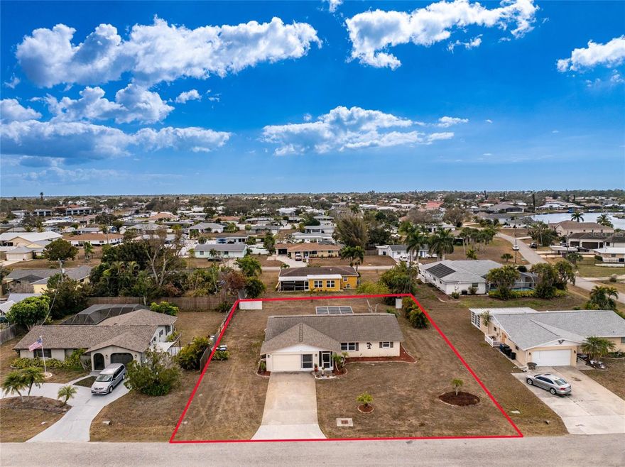 Less Than 3 Miles to the Beach with Picnic Park and Overbrook Gardens Community Boat Ramp Nearby! This furnished, well designed split floor plan features two bedrooms and two bathrooms, each set up as its own private primary suite layout, making it ideal for guests or family visitors. Situated on an oversized lot, the home offers inviting curb appeal with screened garage doors and a screened front entry. Inside, you will find a comfortable living room with a formal dining area and sliding glass doors that open to the glass enclosed Florida room, creating additional living space to relax. The kitchen was nicely updated in 2024 and offers plenty of white cabinetry, generous granite countertop space, a reach-in closet pantry, and tile floors for easy maintenance. The ensuite primary bedroom includes sliding glass doors to the Florida room, a walk-in closet, and a private bathroom with a walk-in shower. The guest bedroom also features sliding glass door access to the Florida room, a walk-in closet, and a pocket door for private access to the guest bathroom with a shower and tub combination. Just outside the Florida room is a screened lanai with plenty of space for patio furniture, the perfect place to enjoy the fresh air and Florida sunshine year round. The large backyard offers endless possibilities with room for boat storage, a pool, outdoor living space, or even a shed for additional storage. Optional Overbrook Gardens HOA membership is low and includes access to the private boat ramp. Members also receive a neighborhood directory with maps and enjoy access to community events and picnics throughout the year. Located just minutes from the pristine beaches, Historic Dearborn Street, and Venice Main Street, with easy access to Siesta Key, Tampa, Orlando, and Naples, this property places you close to world class golf, fishing, boating, arts, and waterfront dining. 1365 De Prie Road offers an easygoing Florida lifestyle in a location that makes sense for full time living, investment, or seasonal enjoyment.