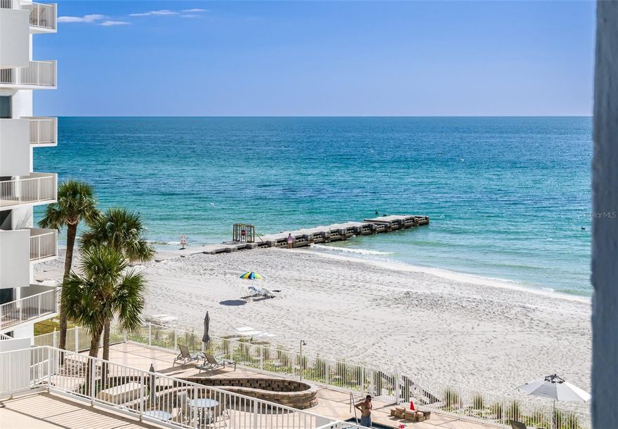****What do a disco ball and the ocean have in common? They both sparkle in the light, and so will you when you make this magical gem your new home. Creatively coined “Studio 54,” located at The Islander Club on Longboat Key Beach, this 2-bedroom, 2-bathroom condominium has an enormous lanai that brings the beautiful island breezes in all year long. The front of this condo faces east, overlooking the lush grounds and the Longboat Key Golf Course. View of Beach from Primary Bedroom. Bring your pet-- an emotional support animal is just fine! 

****This private, gated community features the island’s largest pool and renovated buildings and grounds. Closest building to the water, enormous pool, state-of-the-art gym, and the building is transformed. Newer roof, new covered parking slabs, new tennis and pickleball courts, new plumbing, and elevators (coming soon). Also, you may rent this home out for a minimum of 30 days to 1 year at a time. 

****As you will see in the photos and the professional video tour (available on request), the condo has space that could be innovated into more functional use and creature comforts—such as turning the foyer into a music or piano corner, a zen garden, or built-in storage, and taking the laundry closet and making it an ensuite laundry nook.  The home has Hurricane glass on every window. 

****Studio 54 is a one-of-a-kind opportunity that offers endless possibilities. Imagine your coastal dream life here and bougie on down to be the life of the party in your personal luxury waterfront condo. Don’t end up on the waiting list to get into this "club".