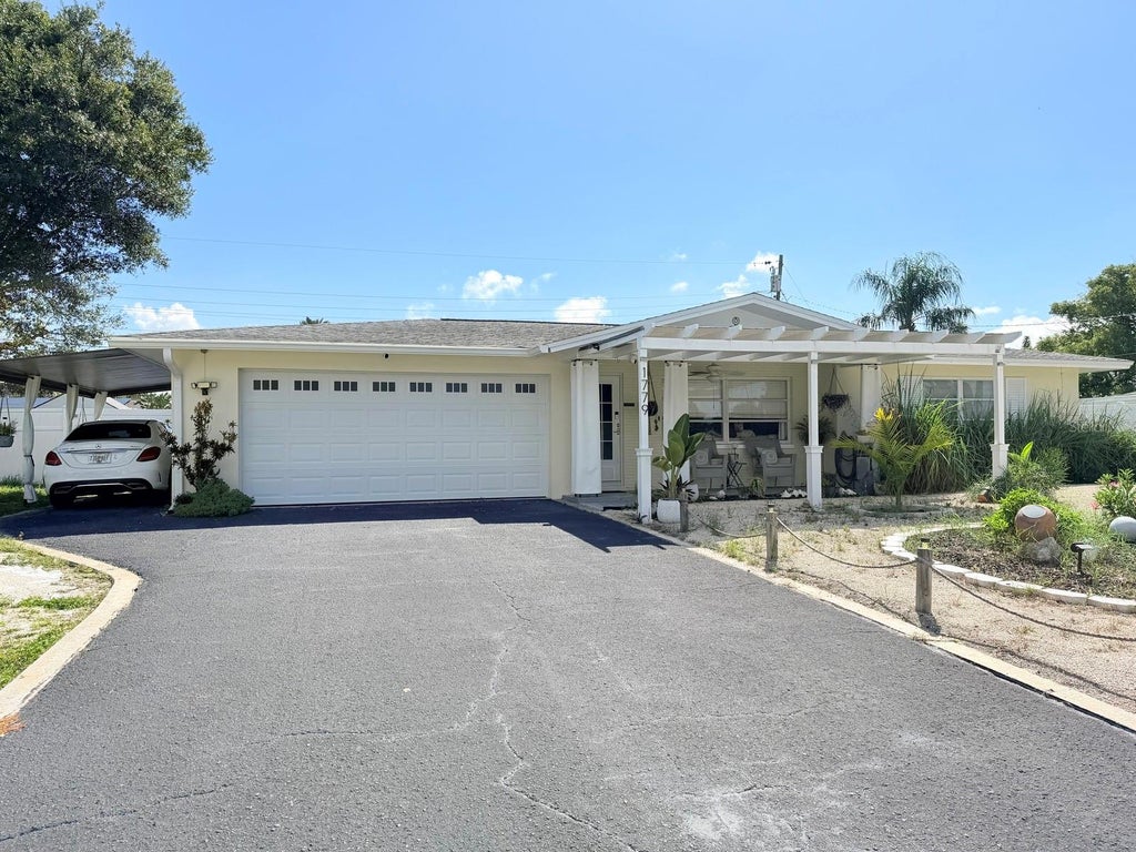Photo of 1779 Avon Lane, Largo, FL 33756 (MLS # TB8549770)