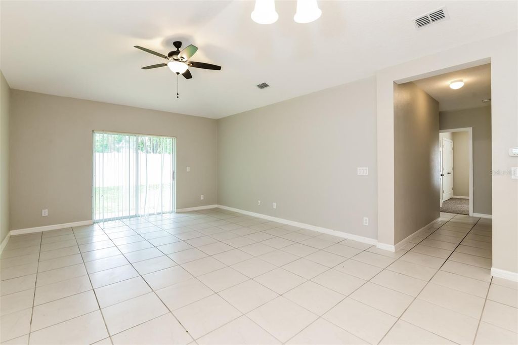 Photo of 216 Whispering Pines Way, Davenport, FL 33837 (MLS # O6348328)