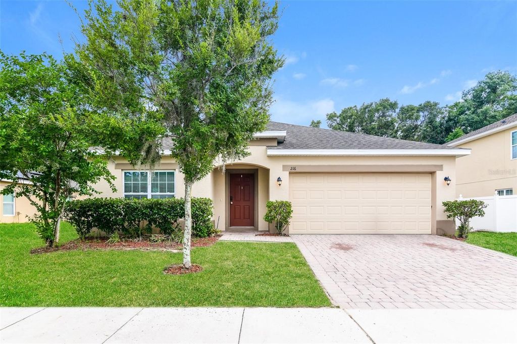 Photo of 216 Whispering Pines Way, Davenport, FL 33837 (MLS # O6348328)