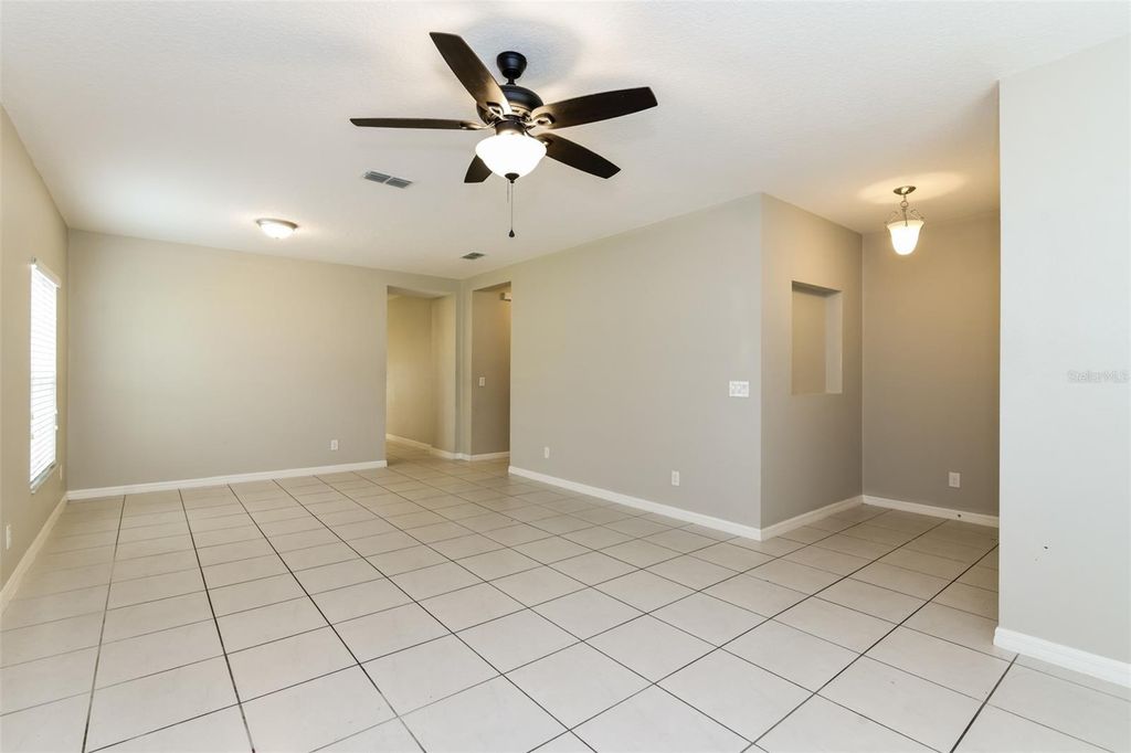 Photo of 216 Whispering Pines Way, Davenport, FL 33837 (MLS # O6348328)