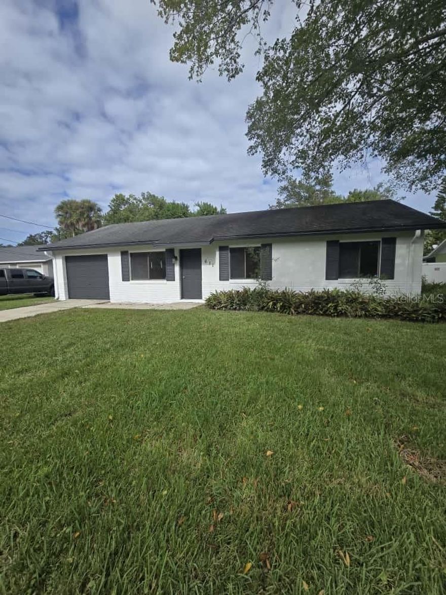 Welcome to this beautifully renovated rental home in a quiet neighborhood! This stunning 3-bedroom, 2-bathroom property features a brand-new kitchen with modern finishes and completely updated bathrooms. The exterior boasts a new paint, while the interior is freshly painted. Elegant flooring throughout the home. Key upgrades include a new roof (2025) and a brand-new washer and dryer combo, as well as new kitchen appliances. Enjoy an enclosed screened porch, and a large fenced backyard for privacy.